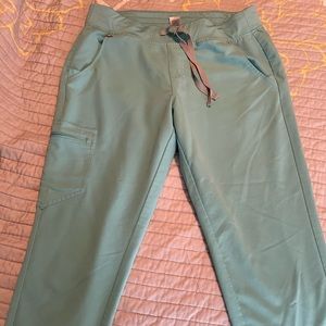 FIGS medium scrub pants. Tiny stain on pocket, see picture.